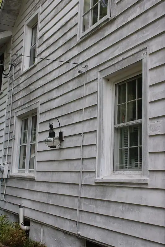 Pressure washing siding